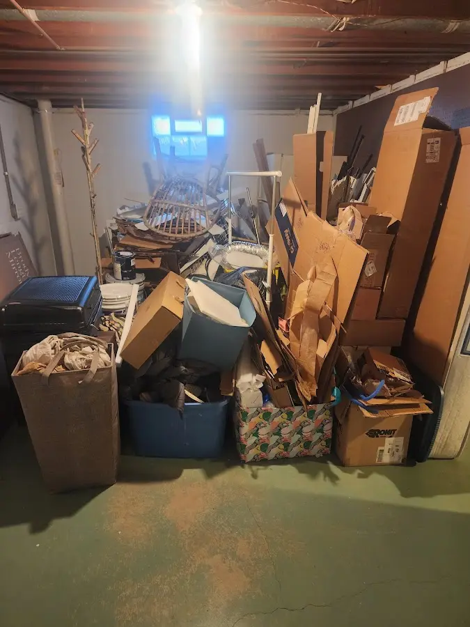 Roll-off dumpster container at job site for 2 Yard Dumpster Rental in Springfield